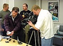 Greg Hupé displaying the NWA 482 main mass for filming during the Spring Lecture Series, University of Washington.